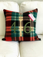Load image into Gallery viewer, Felted Wool Blanket Pillow - Christmasy plaid background with moss green check numbers and mottled cream CN Tower
