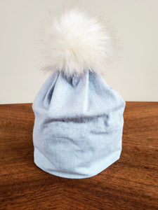 Stretch cotton knit hat with snap off pompom. Easy wash, comfy wear